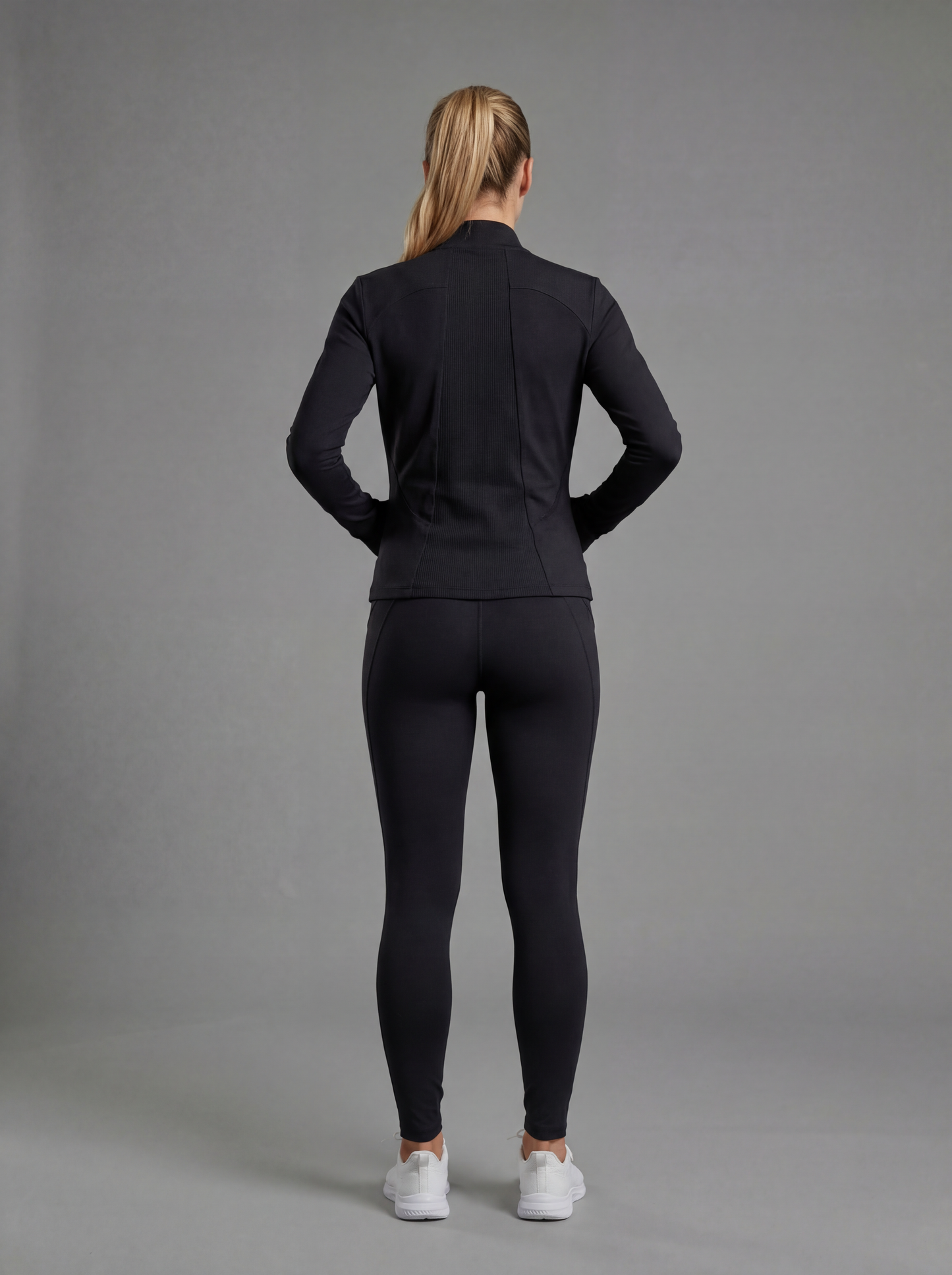 WELIV SculptFit Women’s Performance Jacket in black, back view