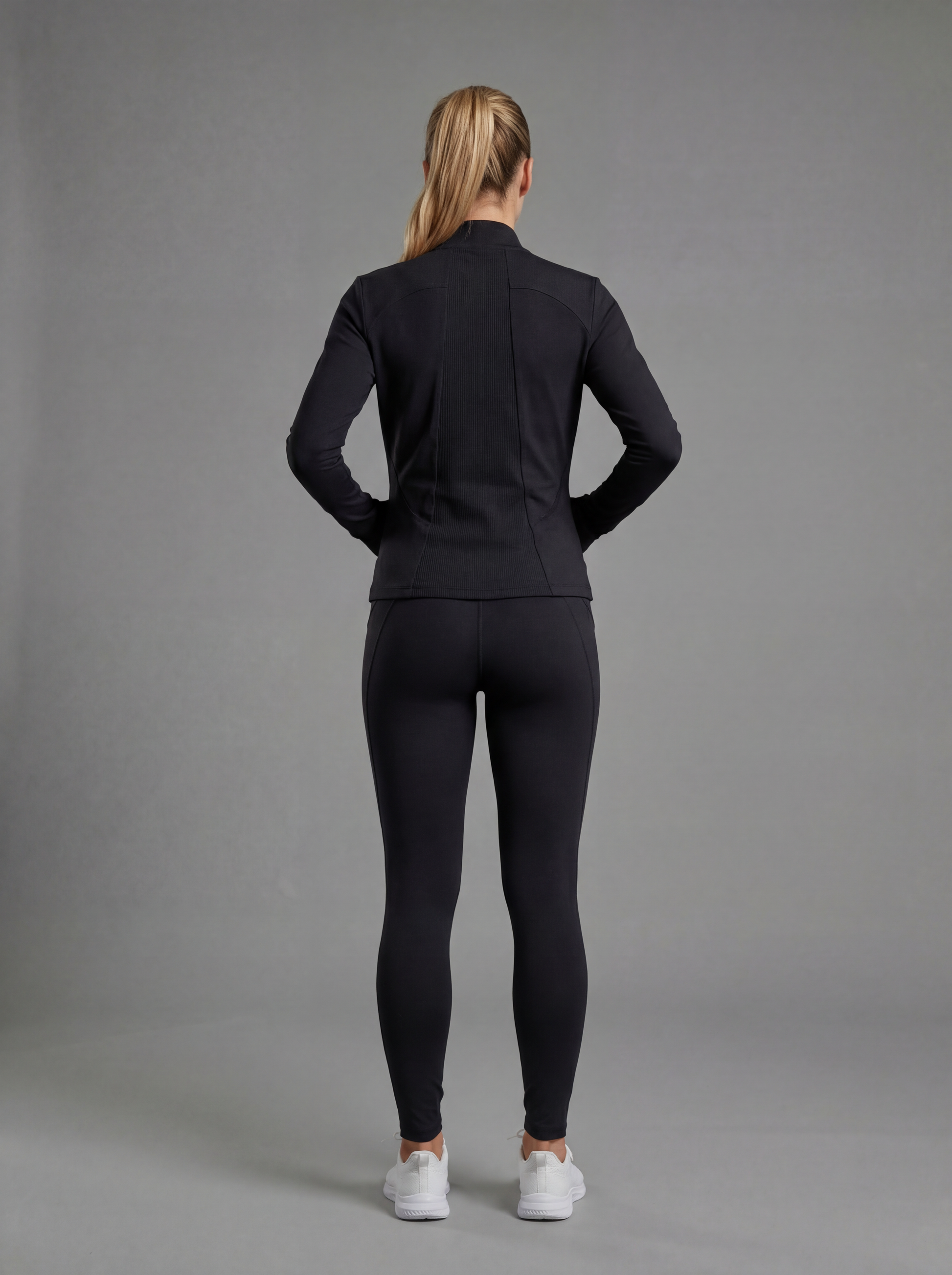 WELIV SculptFit Women’s Performance Jacket in black, back view